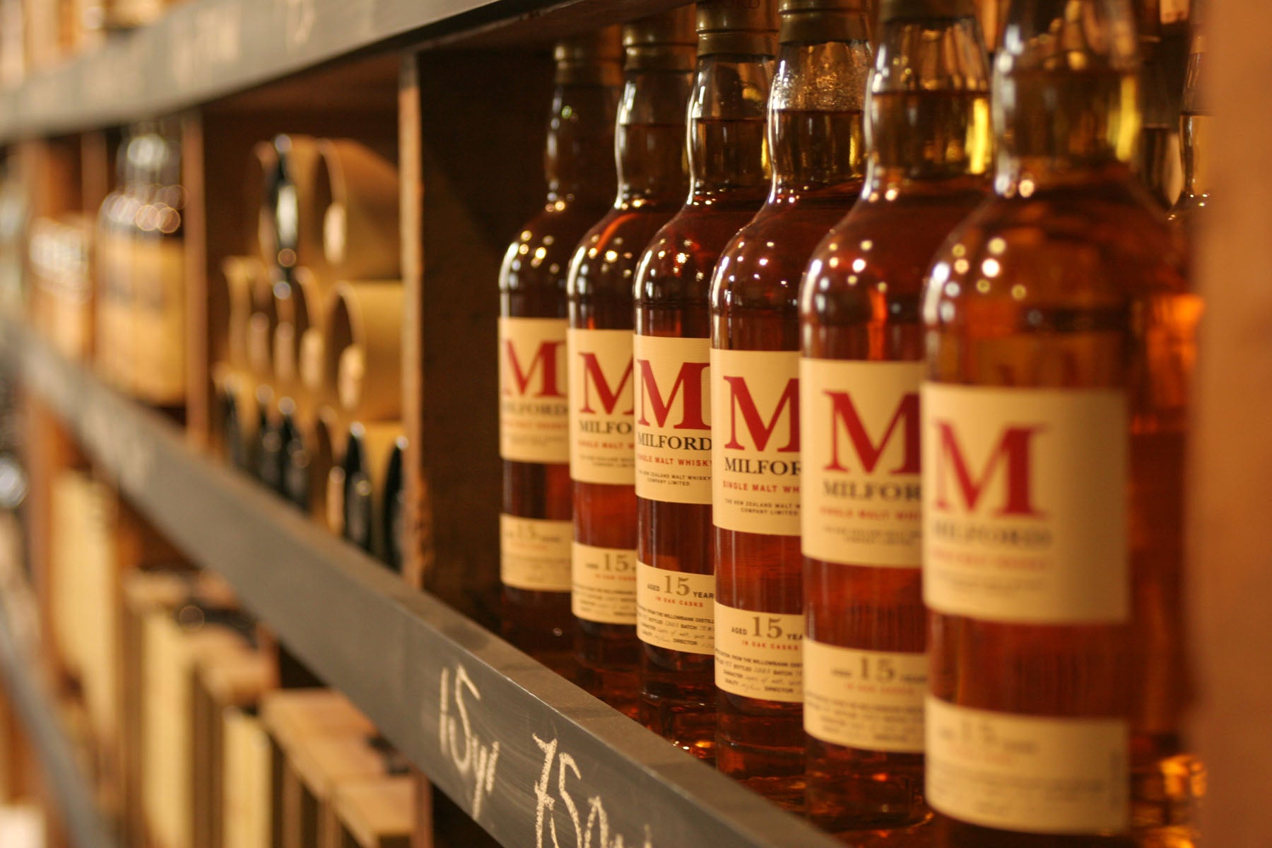 Milford single malt whisky bottles on the shelf